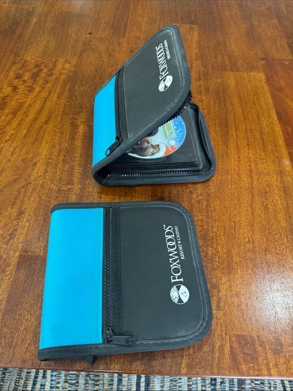 Lot of 2 Y2K CD holders, one has 12 CDs in it, the other is empty